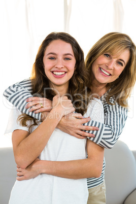 mother embrace her daughter