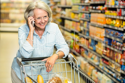 Smiling senior woman on phone call