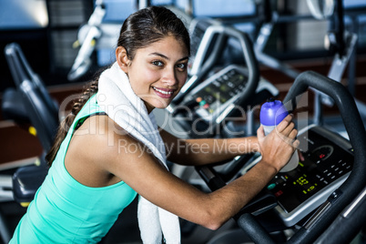 Smiling fit woman taking a break