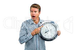 Casual late man showing a clock