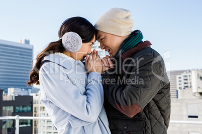 Affectionate couple in winter clothing