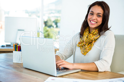 Young girl uses his computer