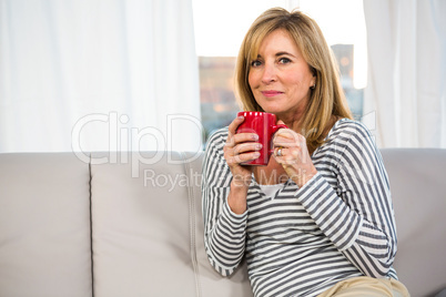 Woman holding a cup