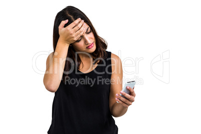 Sad woman using phone