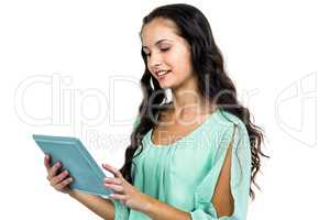 Smiling woman using tablet