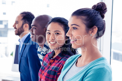 Portrait of Asian businesswoman with colleagues