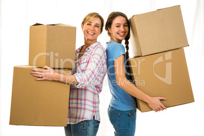 Mother and daughter holding boxes