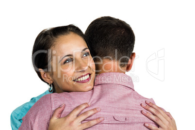 Beautiful woman hugging boyfriend