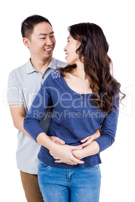 Cheerful couple looking at each other