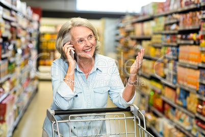 Smiling senior woman on phone call