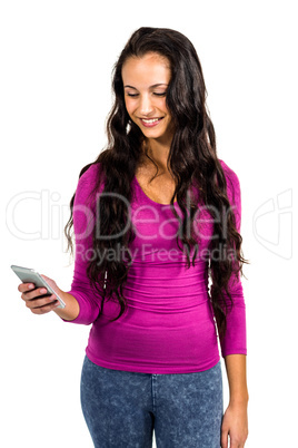 Smiling woman using smartphone