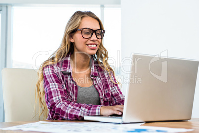 Young girl uses his computer