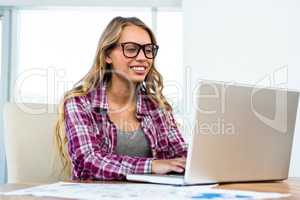 Young girl uses his computer