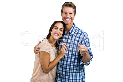 Portrait of happy couple with keys