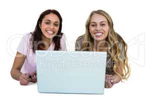 Two girls using a laptop