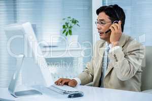 Businessman using headset