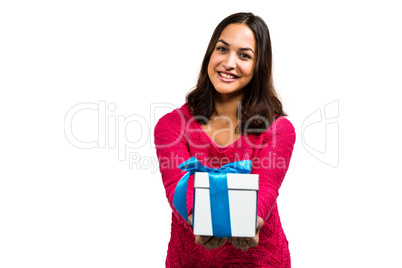 Portrait of smiling woman holding gift