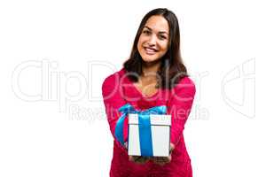 Portrait of smiling woman holding gift