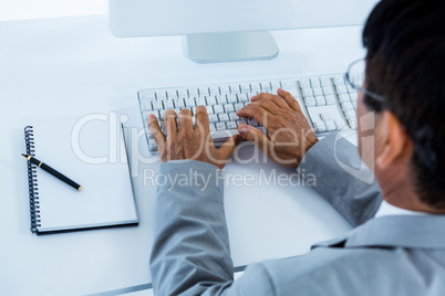 Businessman using his computer