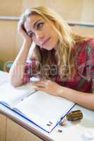 Thoughtful female student during class