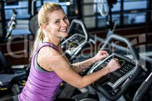 Smiling woman doing bike exercise