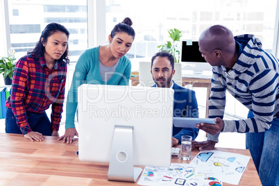 High angle view of business people at desk