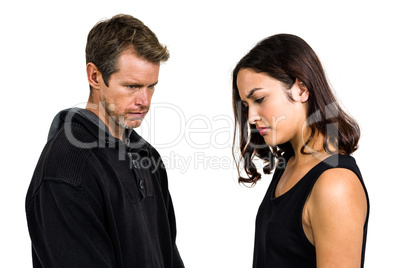 Irritated couple not talking after argument