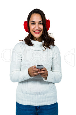 Portrait of happy young woman using mobile phone