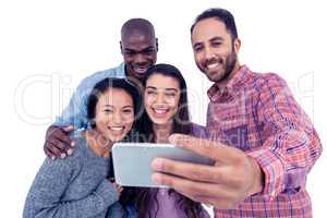Smiling multi-ethnic friends taking selfie