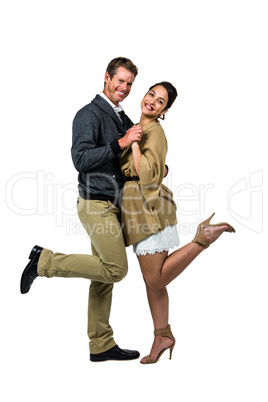 Portrait of happy romantic couple dancing