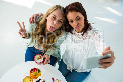 two girls take a selfie