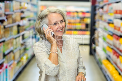 Smiling senior woman on phone call