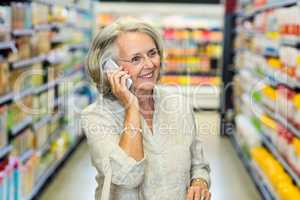 Smiling senior woman on phone call