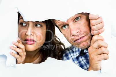 Fearful couple peeking