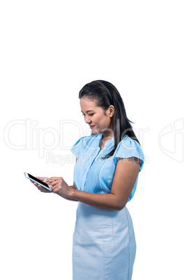 Smiling businesswoman using smartphone