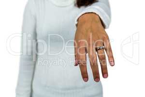 Mid section of woman wearing ring