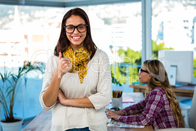 Two girls work at office