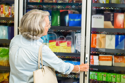 Senior woman buying food