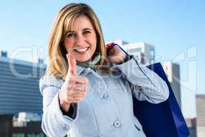 Woman doing a thumbs up