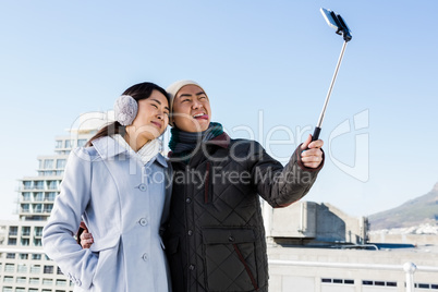 Couple making funny face and clicking pictures