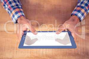 Cropped image of hands using tablet PC