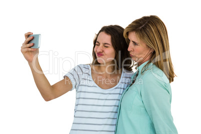 Mother and daughter make a selfie