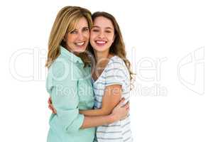 Mother and daughter embracing