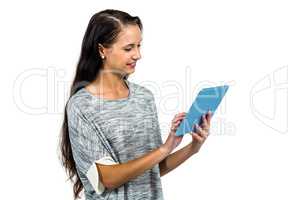 Smiling woman using tablet