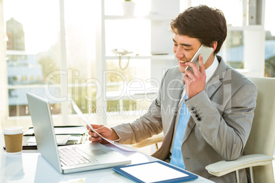 Businessman on his smartphone