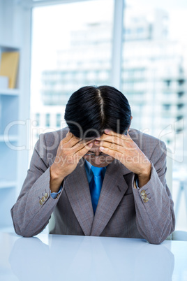 Worried businessman at his desk