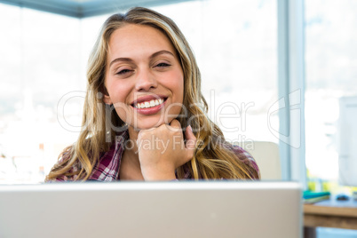 Young girl uses his computer