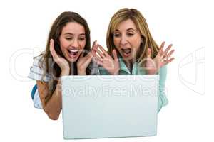 Mother and daughter watch computer