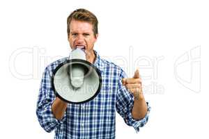 Portrait of angry man yelling through megaphone