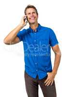 Cheerful man talking on mobile phone